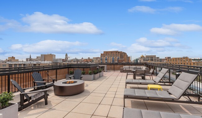 Rooftop sundeck with Wi-Fi access and lounge chairs - Latrobe Apartment Homes