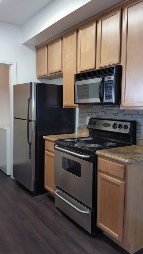 Modern kitchen with stainless steel appliance - 375 Central Ave