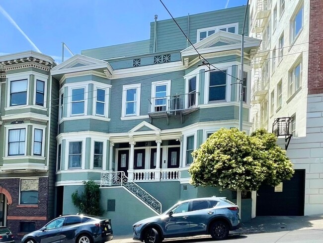 Building Photo - Bright and Airy 2 Bedroom Penthouse in the...