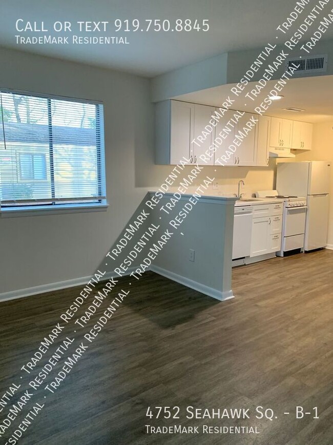 Building Photo - Renovated 1st Floor 1 Bedroom Condo Seahaw...