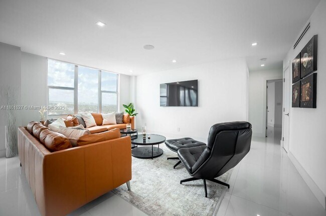 Building Photo - 5600 Collins Ave