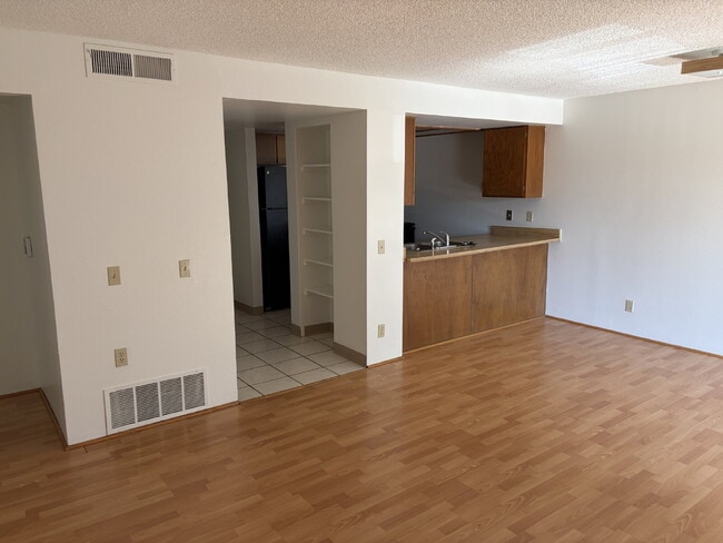 Building Photo - "One Month FREE with signed 12 month lease. Charming 1-Bedroom Condo Retreat with Fireplace and W...