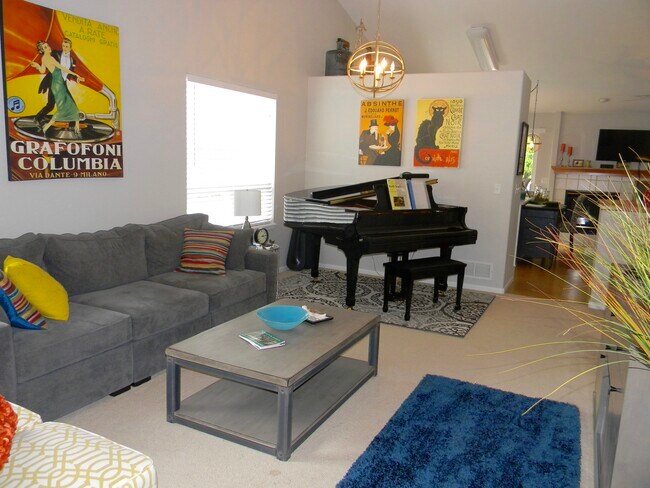 Living/Dining and paint looks fresh...light gray with white trim and new carpet being installed! - 5835 S Harlan St