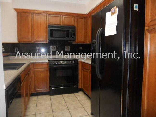 Building Photo - Large 2-story towhome! 2-car attached garage