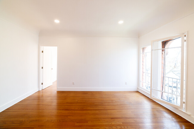 Building Photo - A Grand, Light-Filled 1-Bedroom with Bonus...