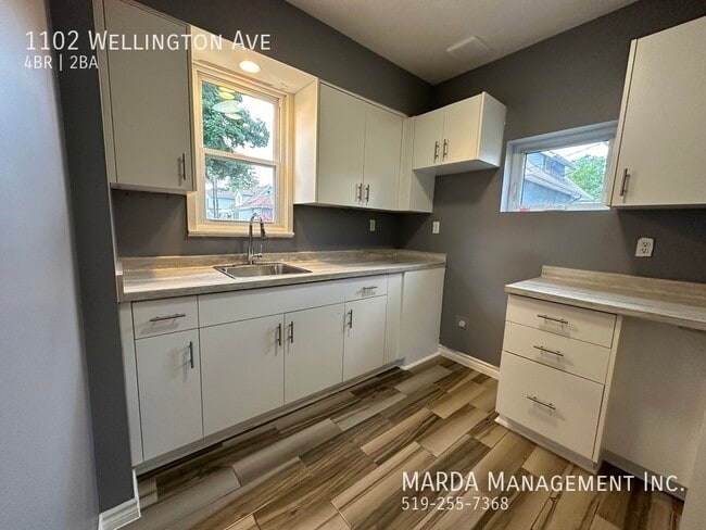 Photo du bâtiment - SPACIOUS 4 BED/2BATH HOUSE WITH BASEMENT! + UTILITIES!