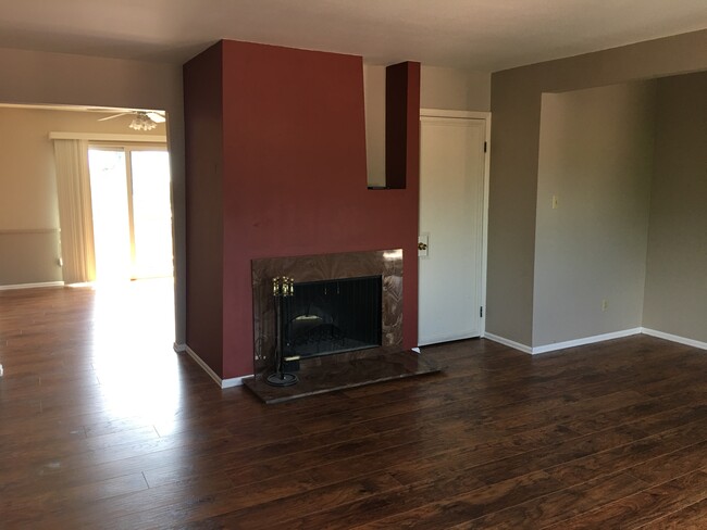 Wood burning fireplace and wet bar behind the door - 2927 Mesa Rd