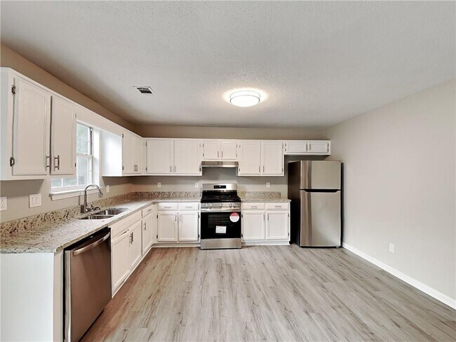Building Photo - 7089 Oakwood Cir