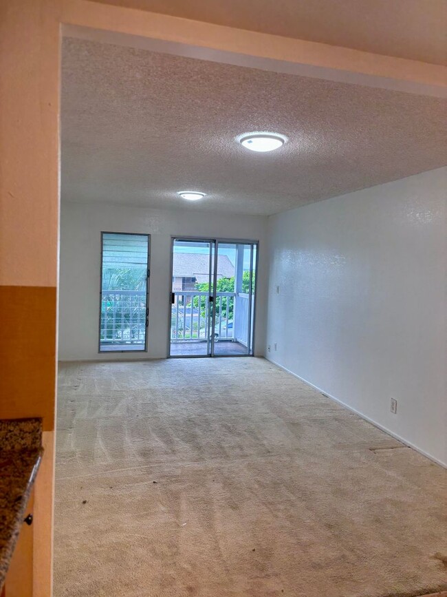 Building Photo - AVAILABLE NOW | 2 Bedroom, 1 Bathroom Townhome | Located at Waiau Garden Court Community | Includ...