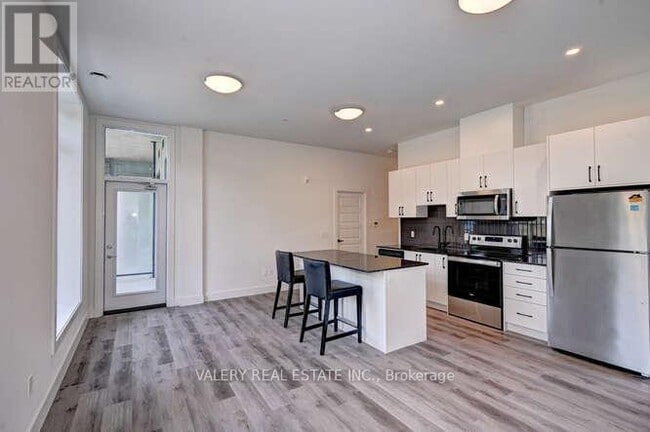 Photo du bâtiment - 103 Roger St