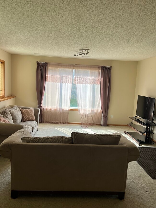 Downstairs tenant living area. - 4711 Adair Ave N