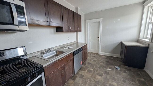 Building Photo - Bright, Spacious Allston 2-bed Near the T