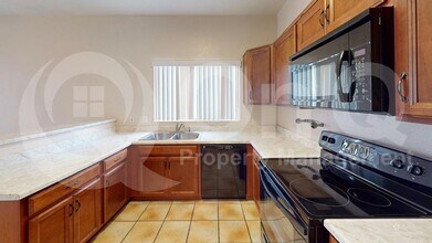 Building Photo - 7283 W Mesquite River Dr