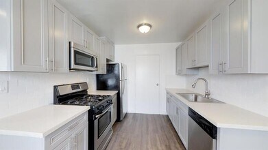 Building Photo - 7016 1/2-7012 Flight Ave