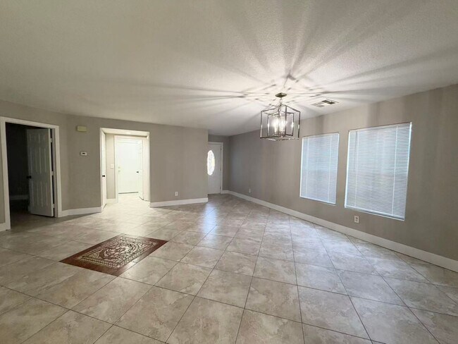 Building Photo - 8469 Cavaricci Ave