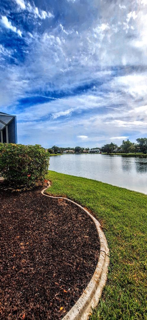 Building Photo - ENJOY LIFE IN THIS 4 BEDROOM UNIQUE LAKE V...