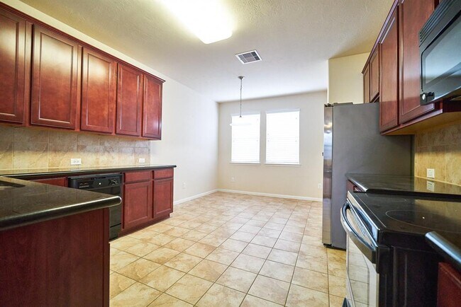 Foto del edificio - 8803 Cedar Mound Ln