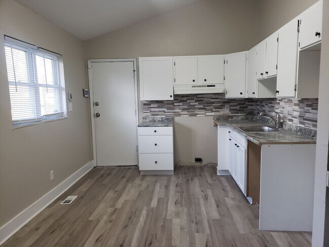 Building Photo - Updated Three-Bedroom Split Level Home!