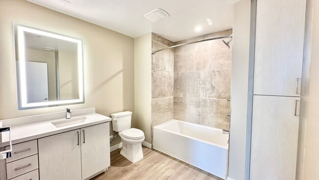 Building Photo - Live the Coastal Life- 2BR/2BA Condo Just ...
