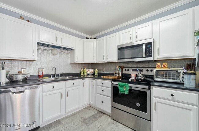 Foto del edificio - 1623 Timber Creek Dr