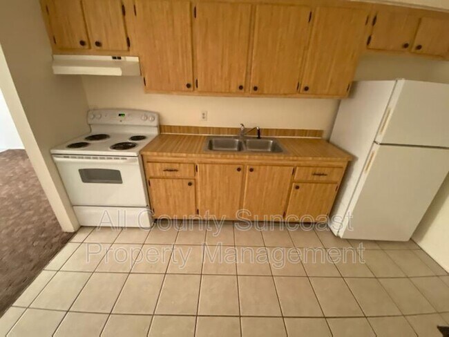 Building Photo - 6283 72nd Ave N