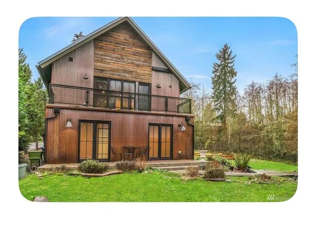 Foto del edificio - Charming 1BR Condo in Kenmore in forest se...