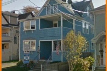 Blue house that's the second house f/m corner - 125 Harborview Ave