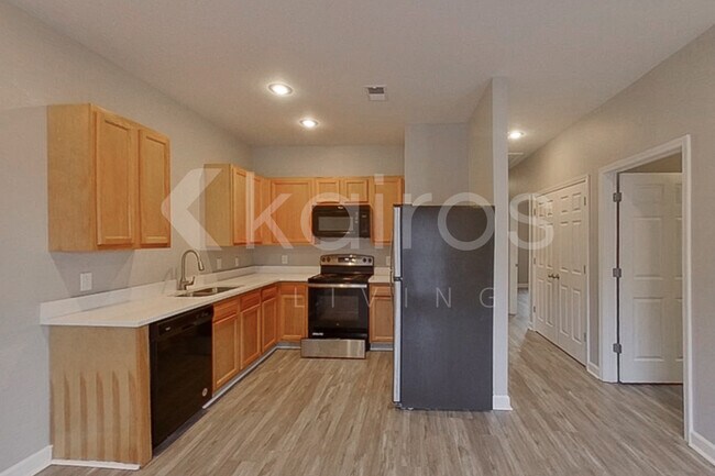 Building Photo - 10103 W 20th St Apt B
