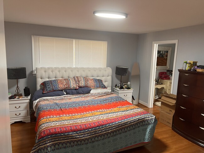 Primary bedroom with vanity room and full bath - 2311 Laurelwood Cir