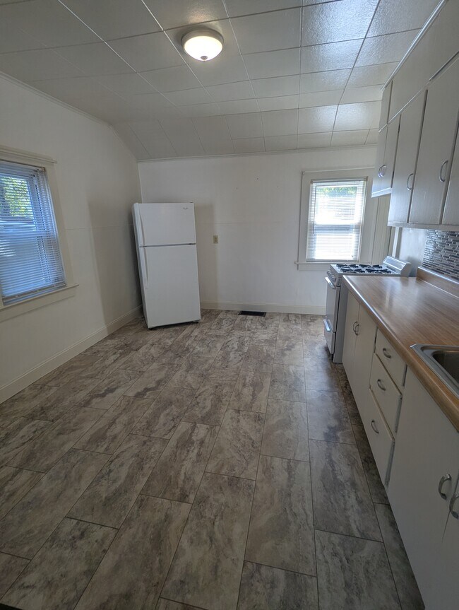 Unit 1 - Kitchen - new flooring - 435 W 29th St
