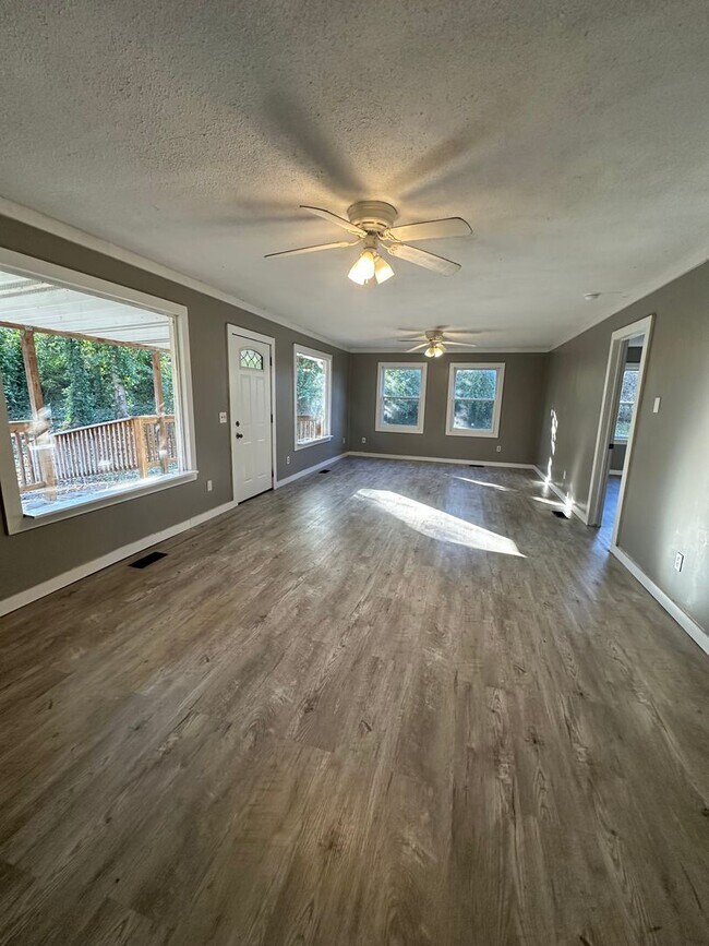 Building Photo - Creekside Escape with Three Decks