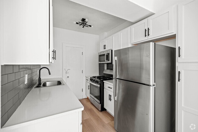 2BR, 1BA - 800SF - Kitchen - Manstan
