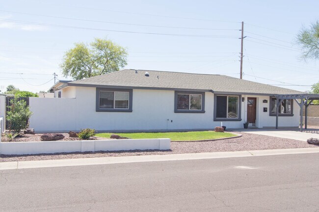 Building Photo - 7001 E Vernon Ave