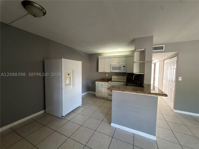 Building Photo - 11448 NW 43rd St