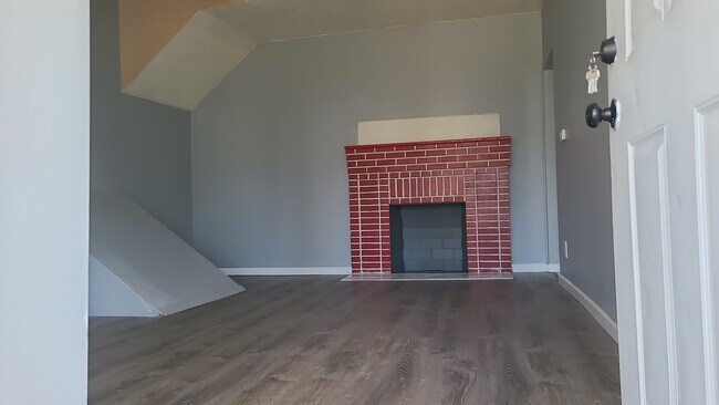 Living room fire place. - 44 Irving St