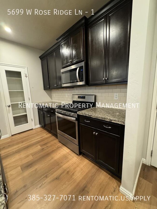 Building Photo - 5699 W Rose Ridge Ln