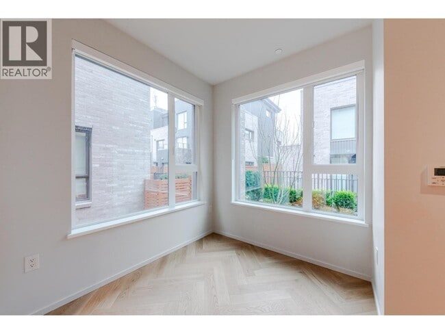 Building Photo - 765 W 49th Ave