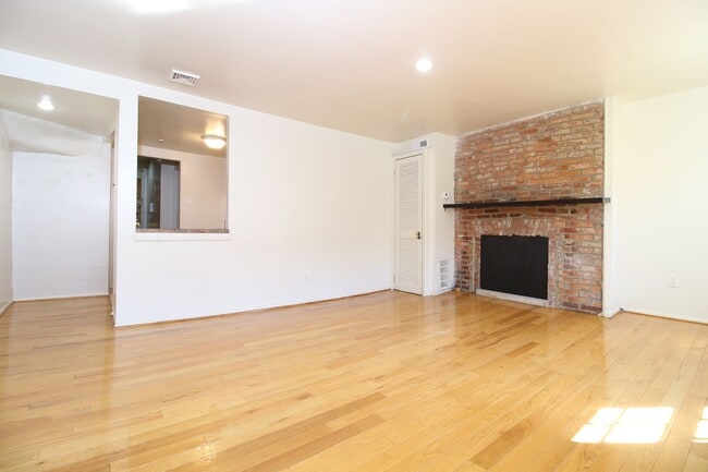 Building Photo - Spacious 2 BR 2 BA w/ Decorative Fireplace...