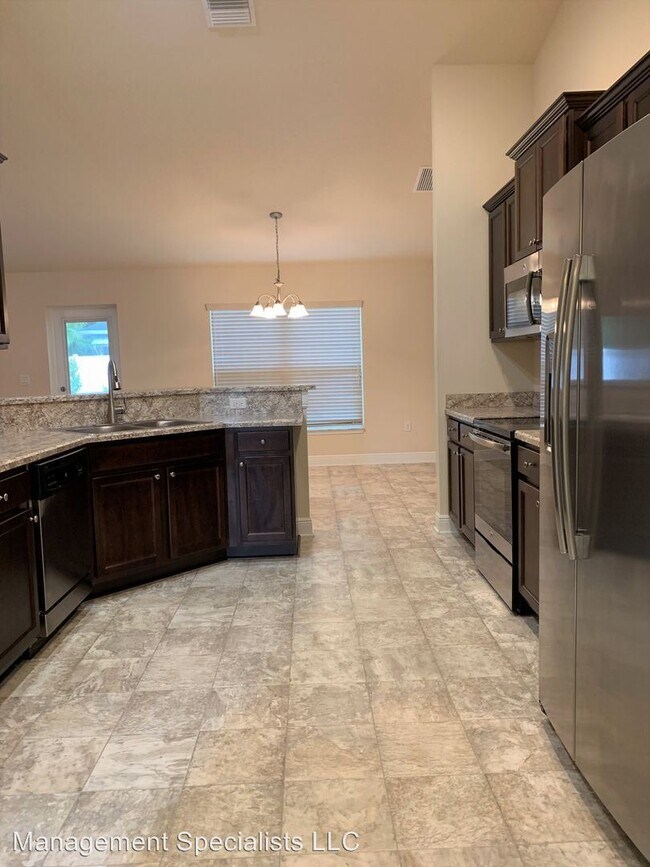 Building Photo - 4 br, 2 bath House - 3273 SW Rosser Blvd