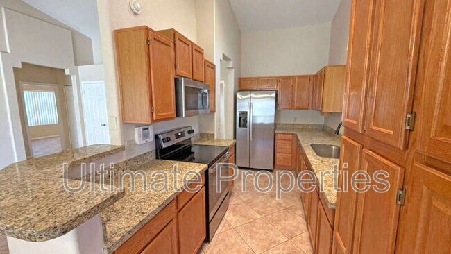 Foto del edificio - 6124 W Whispering Wind Dr