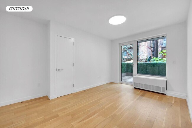 Building Photo - 111 E 115th St