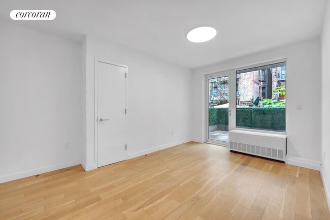 Foto del edificio - 111 E 115th St