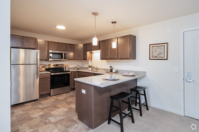 2BR, 1BA - 865SF - Kitchen - Fishers Run Senior Apartments
