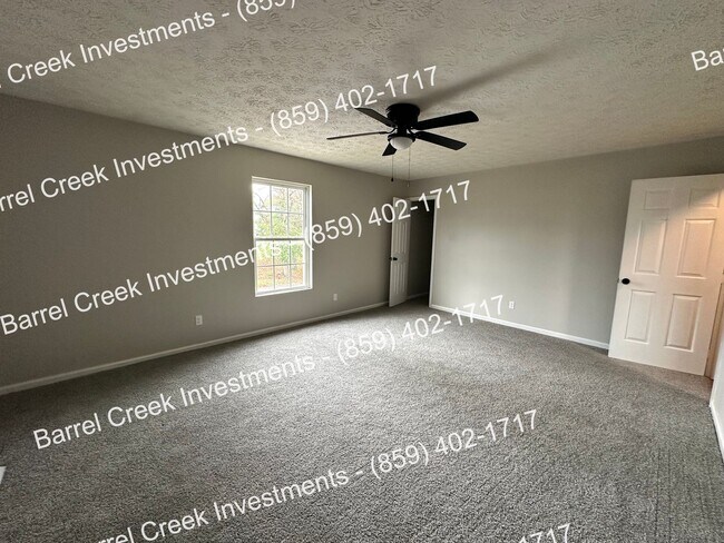 Foto del edificio - 2-Bed, 1-Bath Townhome with Attached Garag...