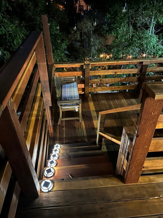 Private balcony steps leading to deck - 1711 Holly Dr