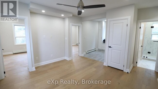 Building Photo - 2002 Queen St E