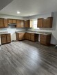 New kitchen with granite counter tops - 104 Greenbrier Hls
