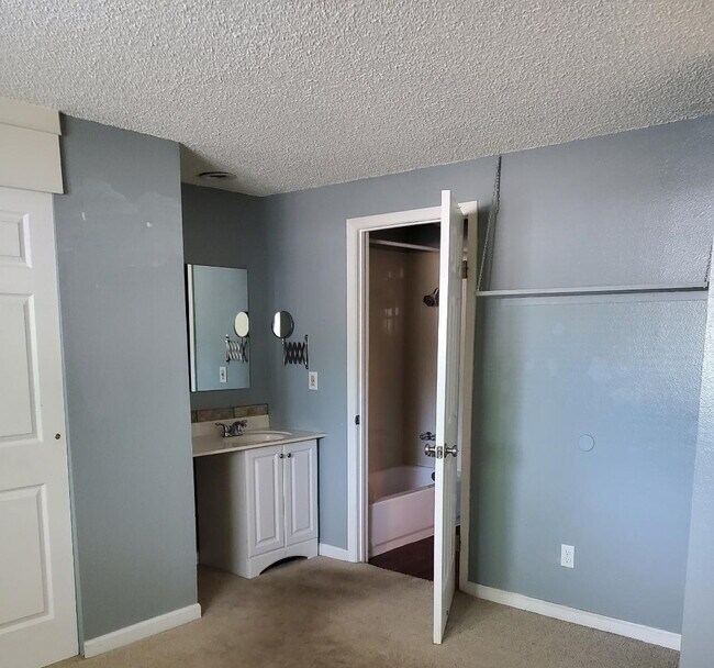 Separate sink and mirror in master bedroom - 925 Columbia Rd
