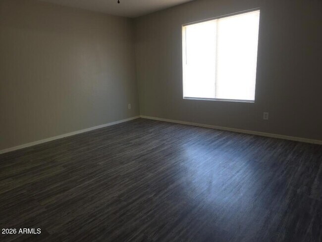 Building Photo - 23942 W Lasso Ln