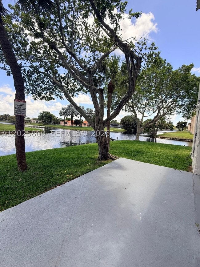 Building Photo - 8595 Sunrise Lakes Blvd